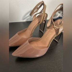 Vinil and leather pumps